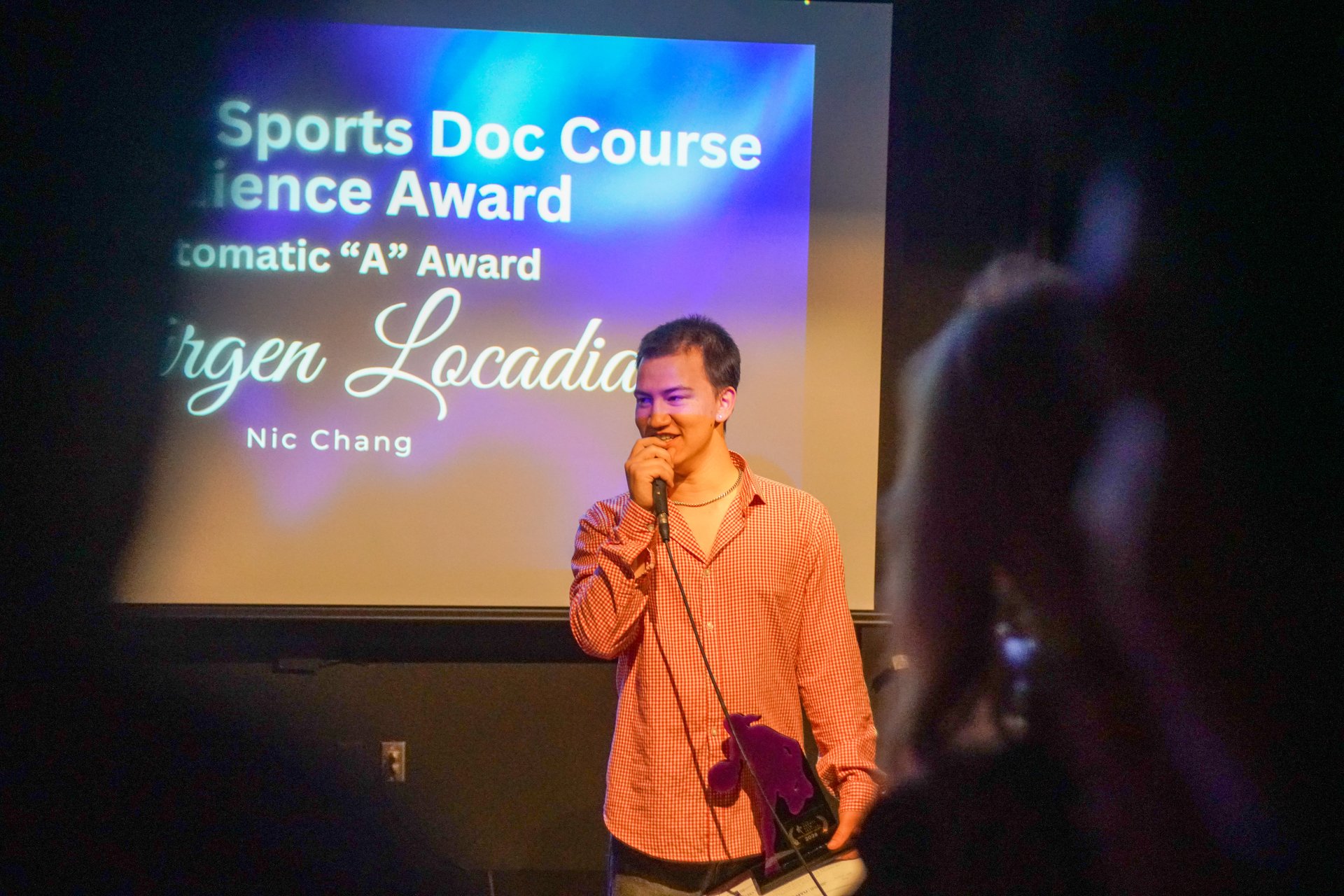Nic Chang accepts the Sports Documentary Course Audience Award